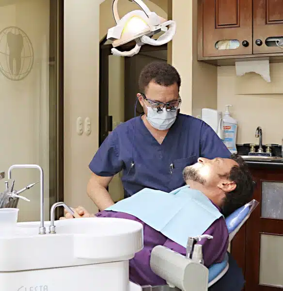 Dentist treating a patient in a modern clinic